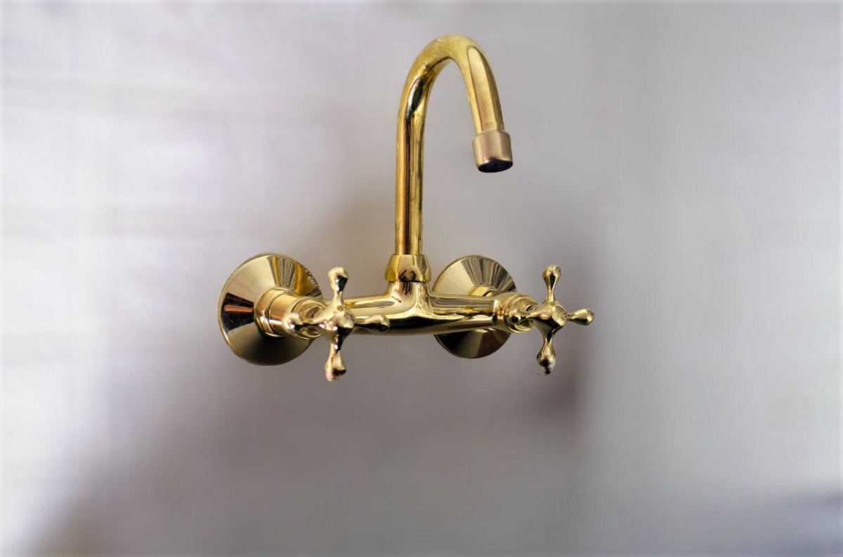 Unlacquered brass wall faucet