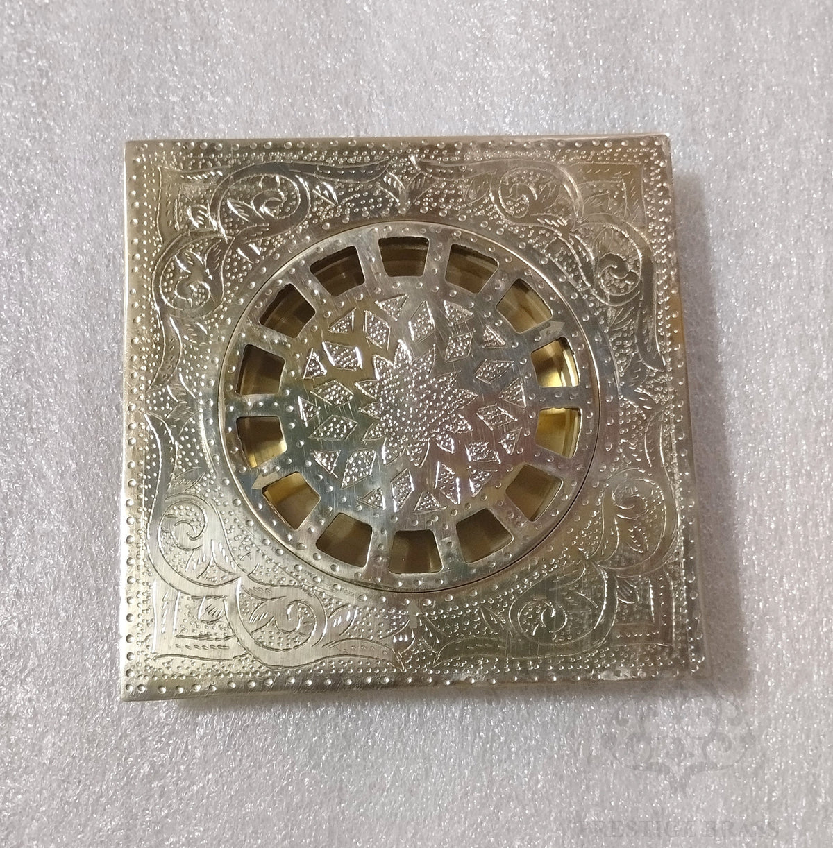 Engraved square shower drain crafted from durable brass