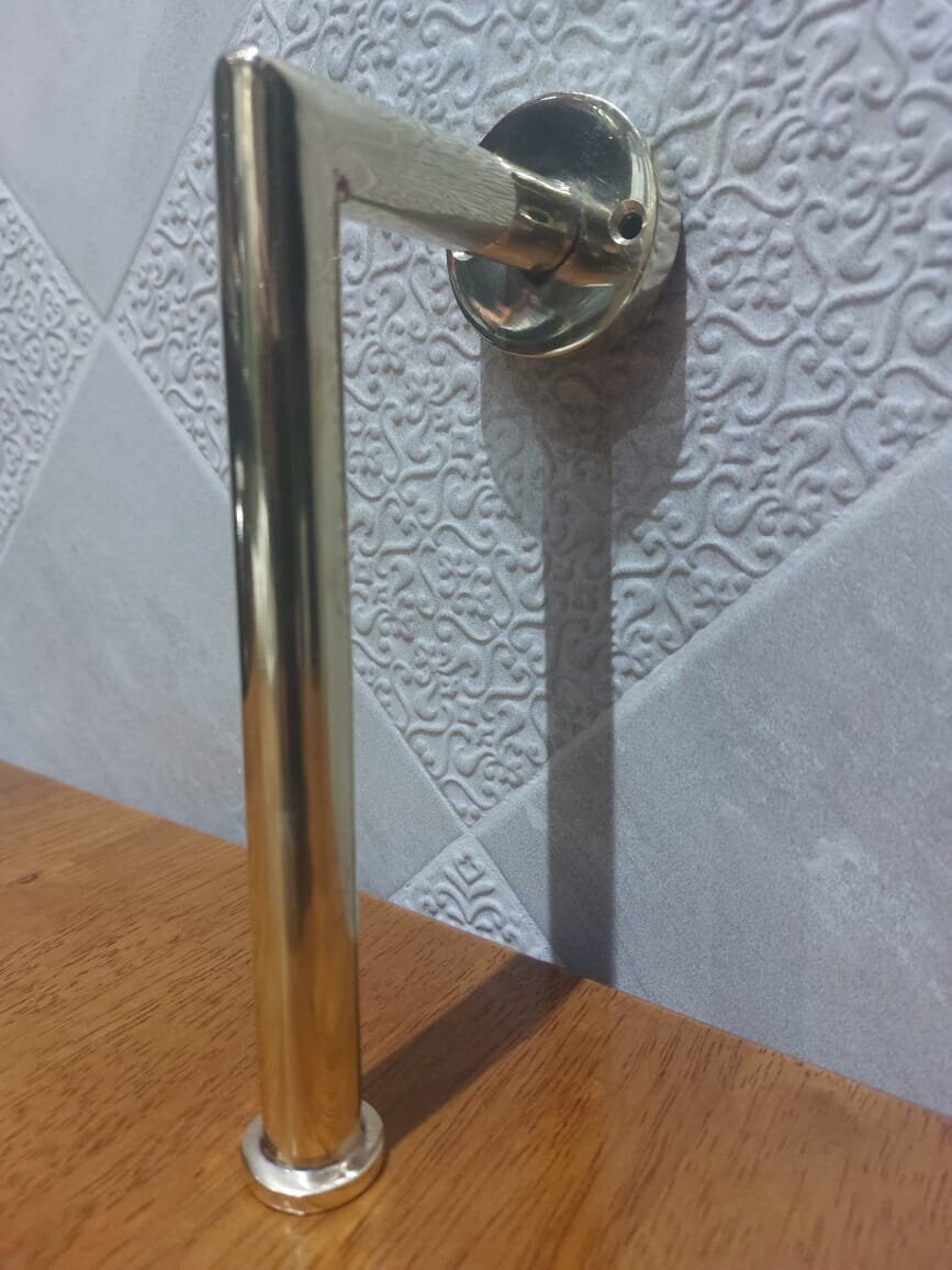 Unlacquered Brass Toilet Paper Holder. Crafted from solid brass, this handcrafted tissue holder exudes timeless elegance