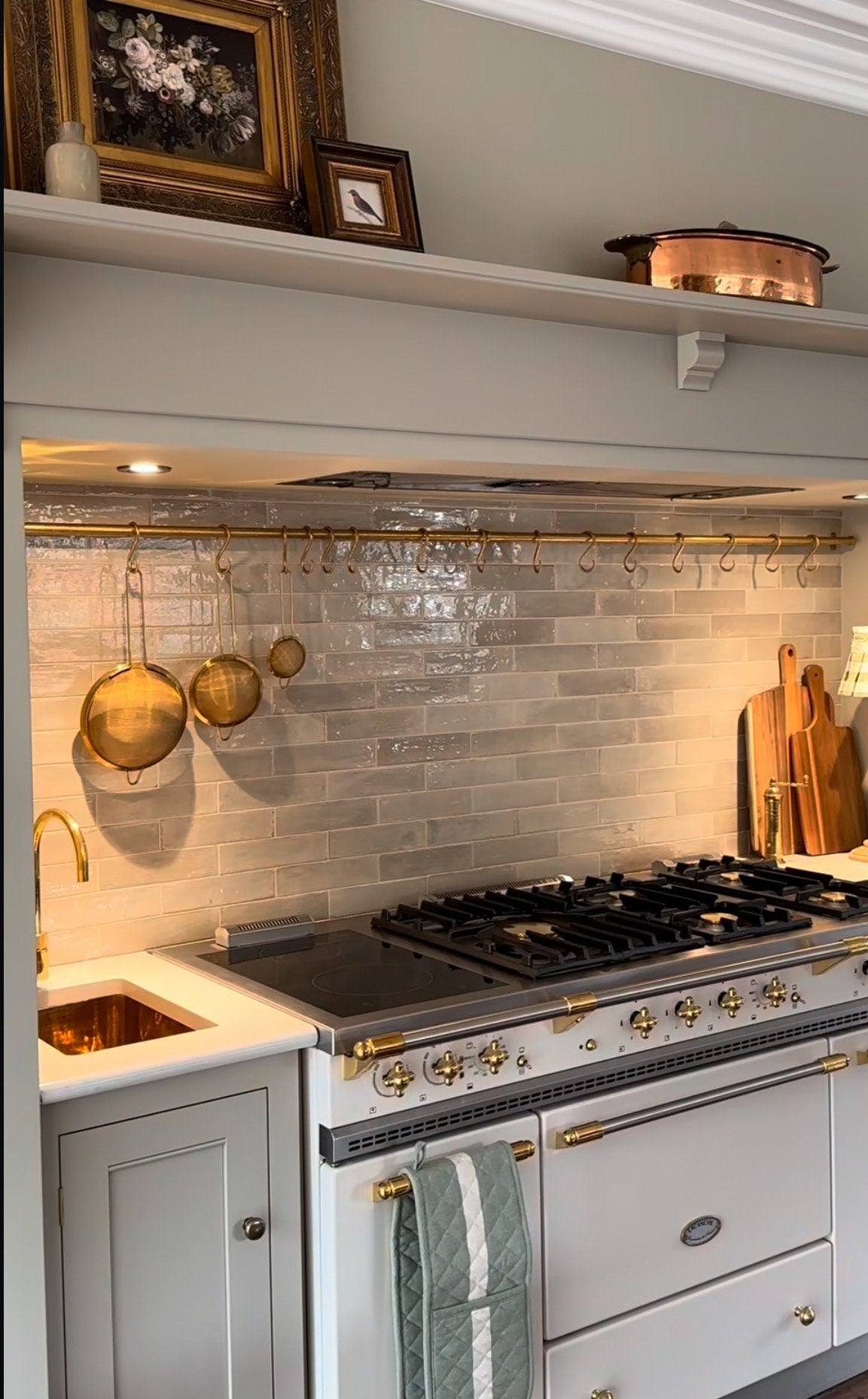 Unlacquered brass pot rail with brass "S" hooks. Solid brass