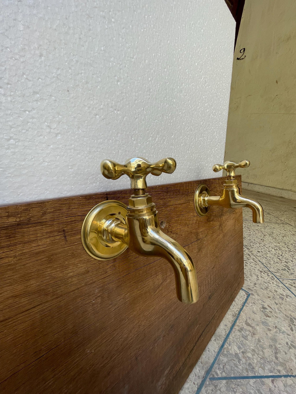 Unlacquered Brass Wall Faucets