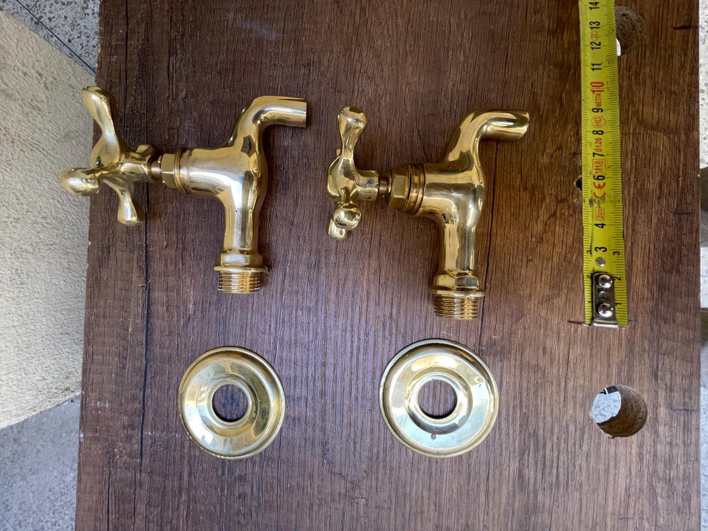 Unlacquered brass wall faucets - Unlacquered plain end faucet.