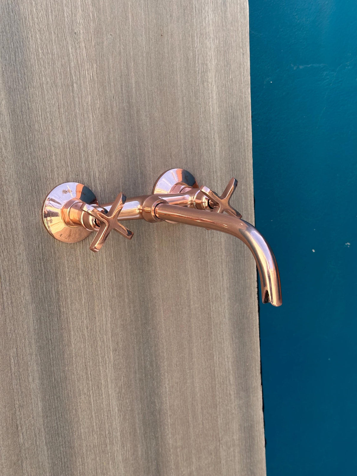 Copper exposed wall mount faucet