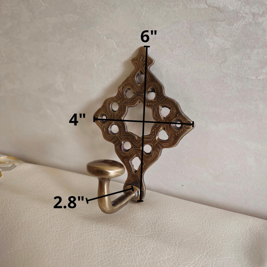 Pierced brass wall hook